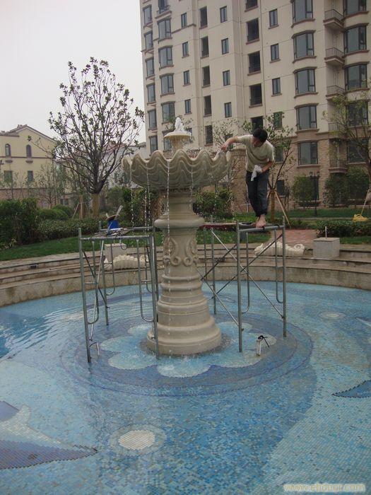 上海砂岩雕塑公司—砂岩喷水雕塑